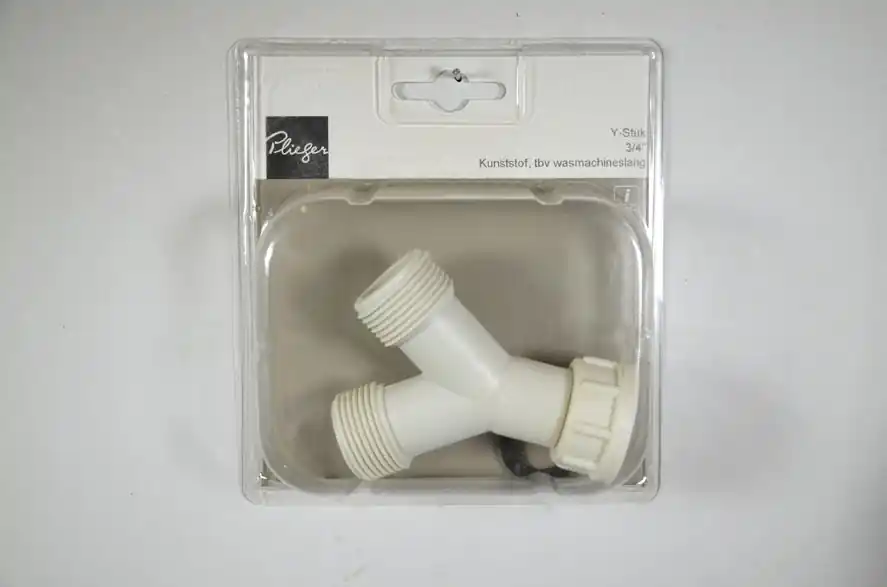 Kunststof y-stuk tbv 2aansl 3/4 inch Plieger label gri